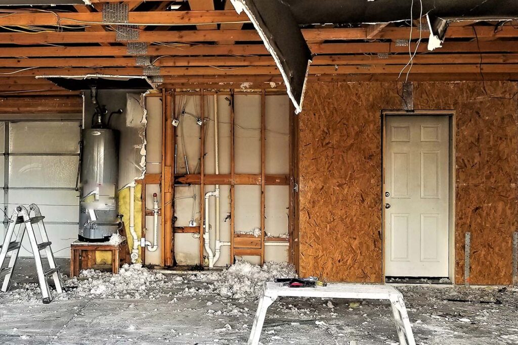 garage in the process of being restored after fire and water damage